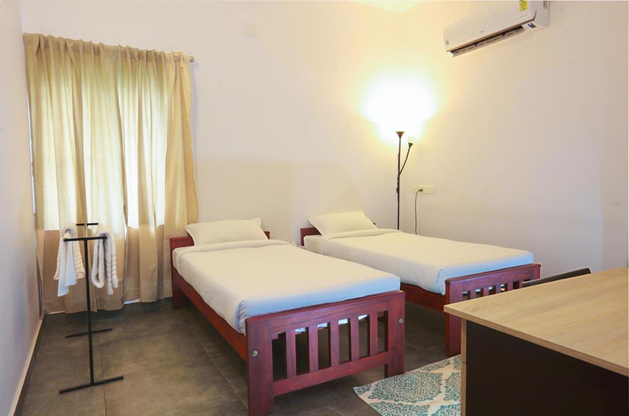 Monsoon Apartments كانور المظهر الخارجي الصورة