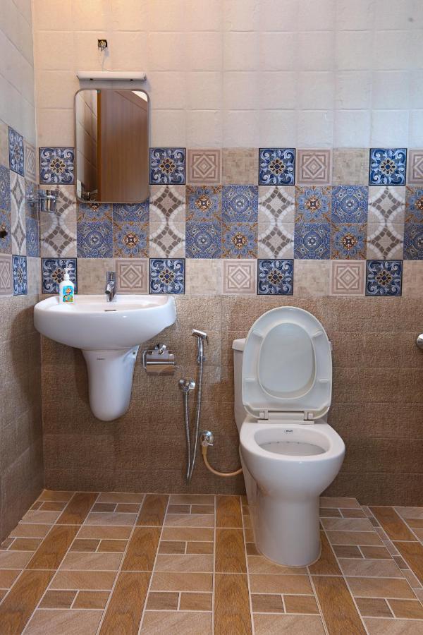 Monsoon Apartments كانور المظهر الخارجي الصورة